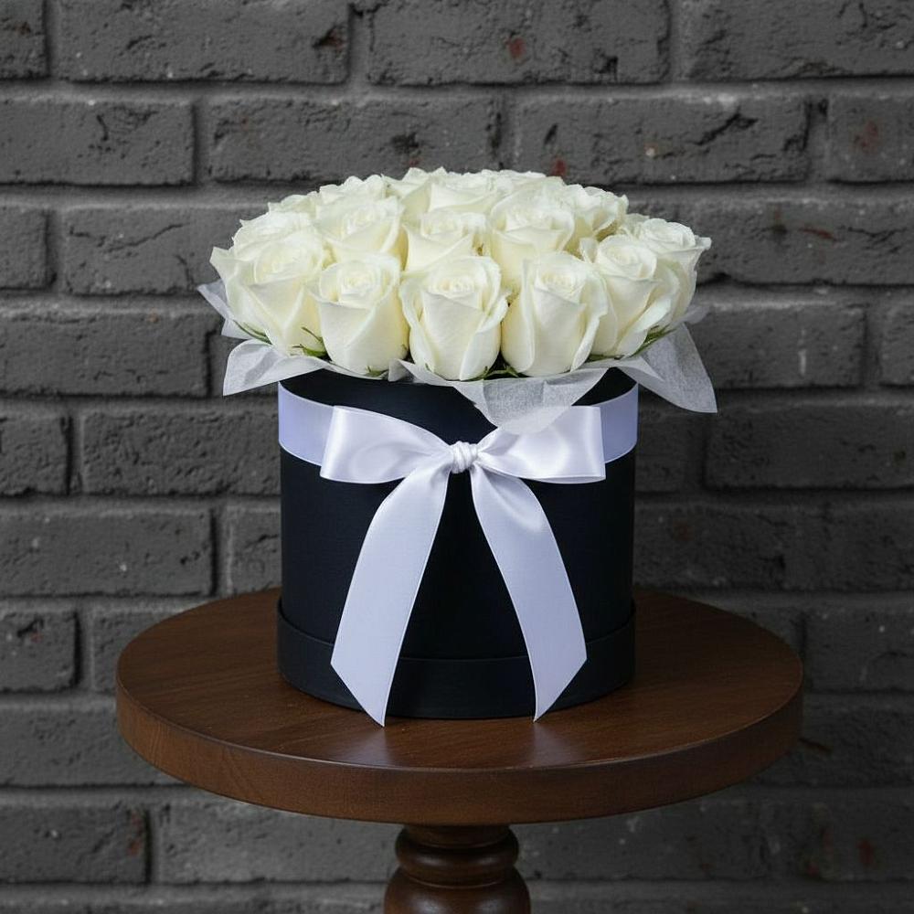 Цветочная композиция из Розы в шляпной коробке в Борисоглебске